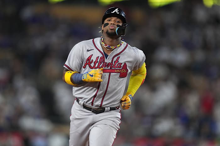Aug 31, 2023; Los Angeles, California, USA; Atlanta Braves right fielder Ronald Acuna Jr. (13) runs the bases after hitting a grand slam home run in the second inning against the Los Angeles Dodger at Dodger Stadium.